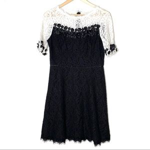 Shani black lace dress with Daisy details